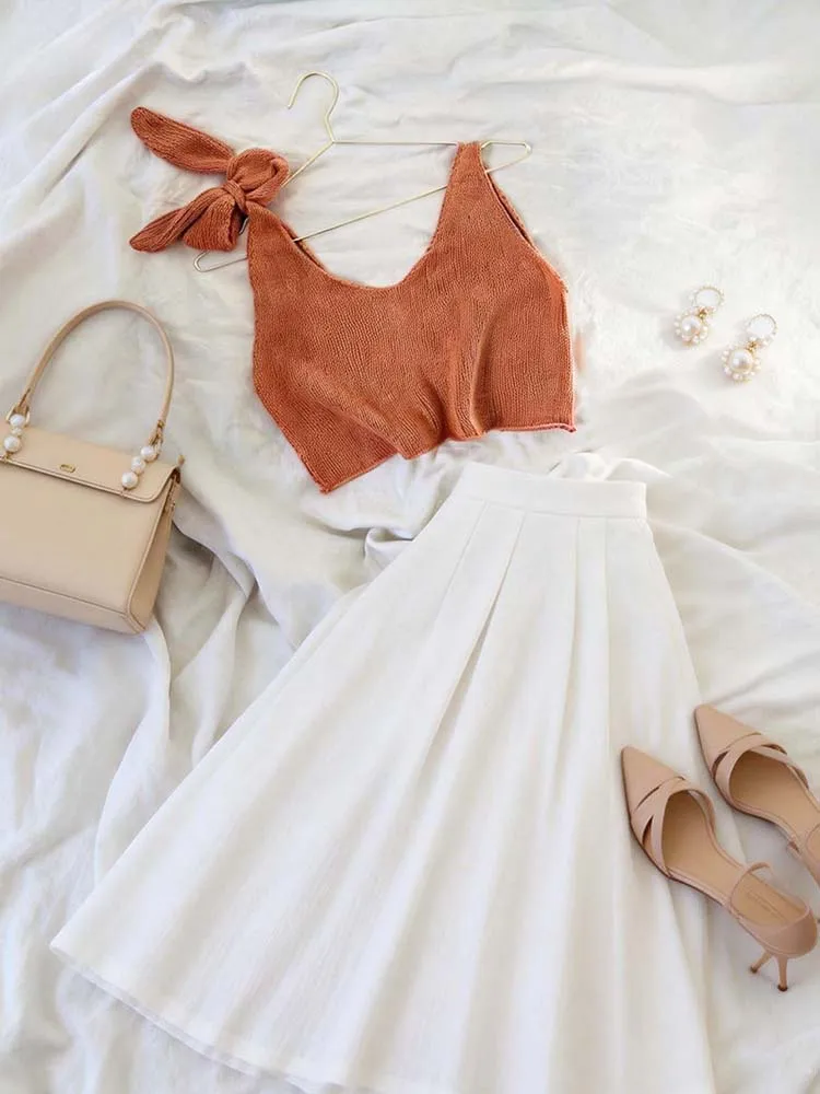 

Женский вязаный жилет с V-образным вырезом и бантом, модный, универсальный и повседневный, подходит для ежедневных прогулок, поездок на работу, отпуска и свиданий.