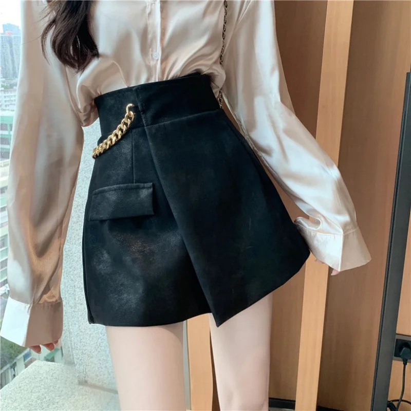

Новая осенняя мини-юбка из искусственной кожи, женская модная цепочка, асимметричная сексуальная горячая девушка, шорты на бедрах, юбки, повседневные карманные юбки