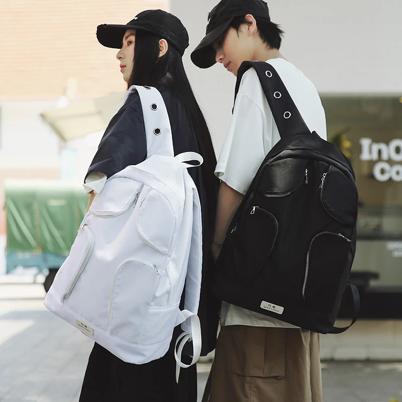 

2025 European And American Fashion Nylon Fabric Multi Pocket Large Capacity Backpacks Simple Casual Versatile Women's Bag Trendy