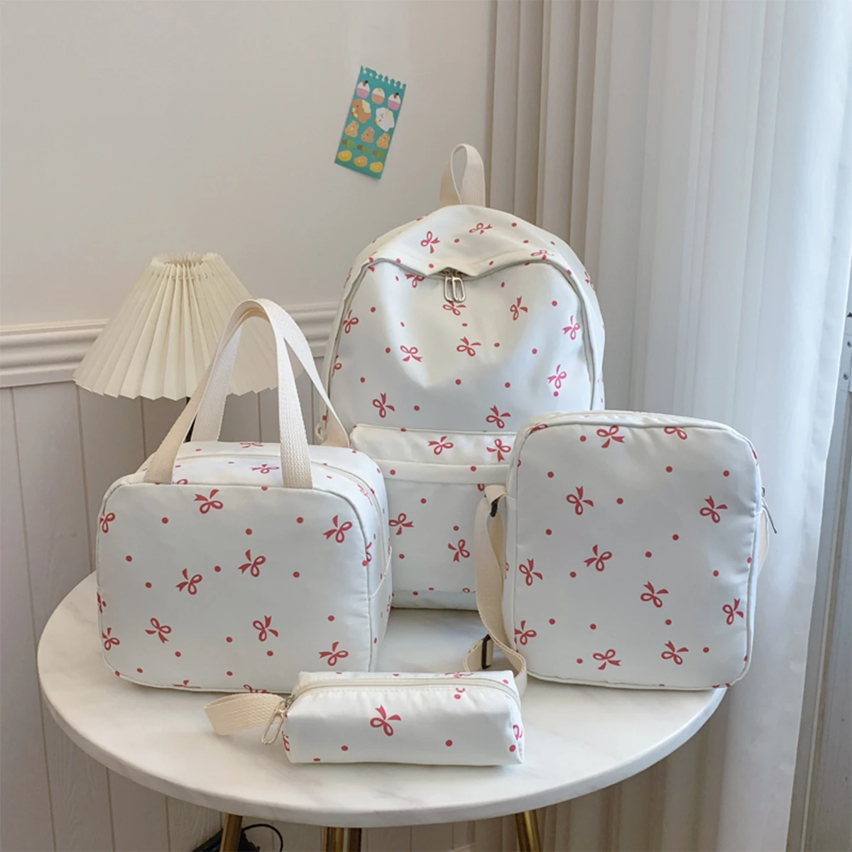Conjunto de mochila con estampado de lazo de 4 piezas para mujer, bolso cruzado, bolso y estuche para lápices, paquete escolar ligero con múltiples bolsillos