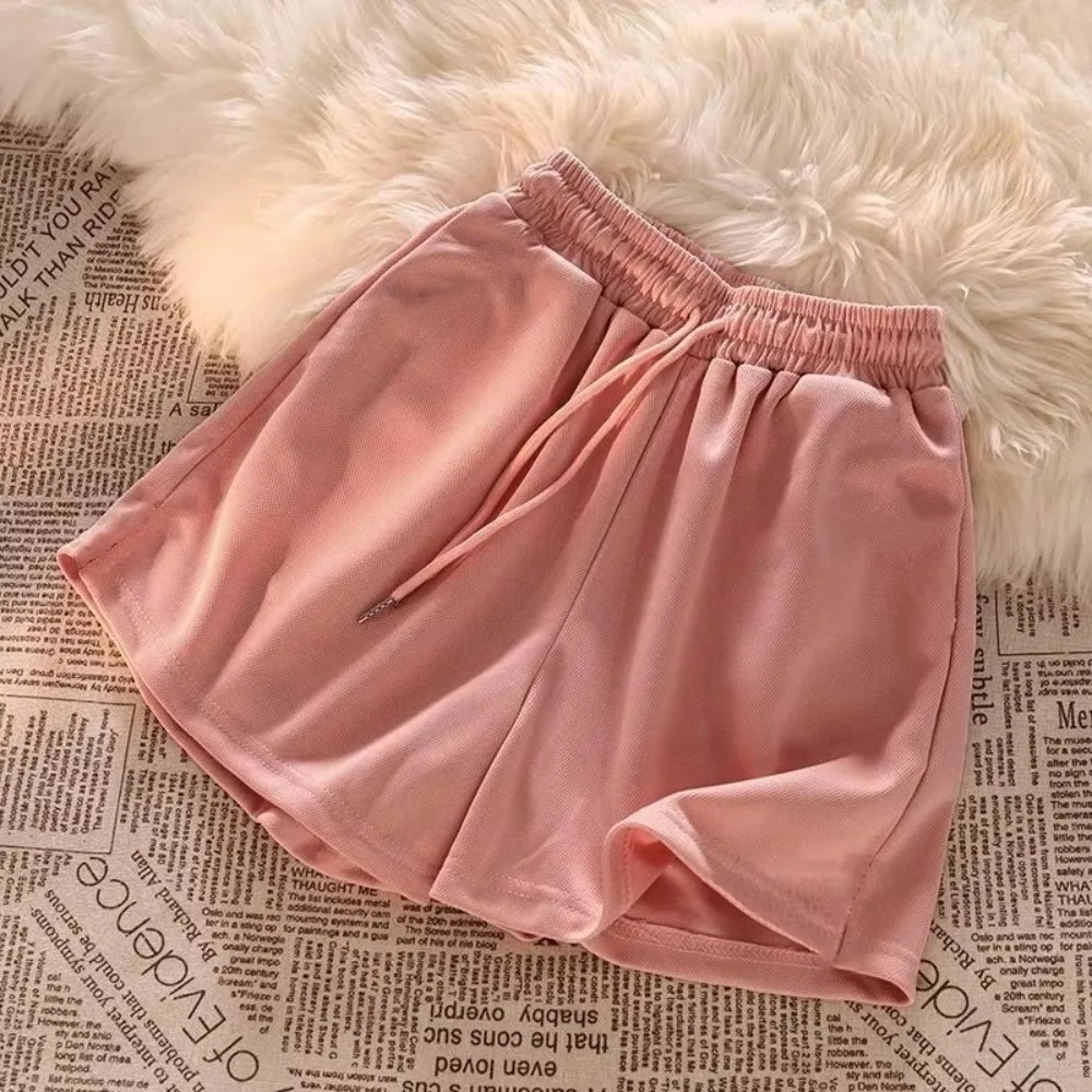 Nouveaux shorts décontractés de couleur unie, tissu respirant, coupe confortable, shorts de fitness, taille à cordon de serrage, shorts de course pour femmes