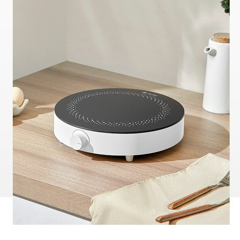 Multifunctional induction cooker mini small does not occupy an area of household dormitory round hot pot stir-fry high power
