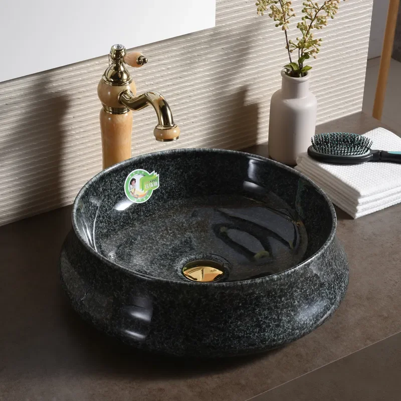 Modern Oval Ceramic Washbasin High Gloss Pearl Glaze Bathroom Sink Elegant Countertop Basin for Home Hotel Decoration