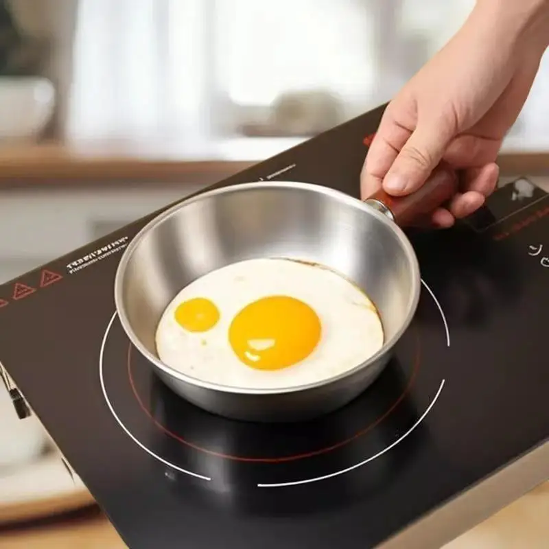 وعاء من الفولاذ المقاوم للصدأ لشخص واحد مع مقبض من خشب الجوز لسلطة الفاكهة، وأدوات المطبخ للمطعم