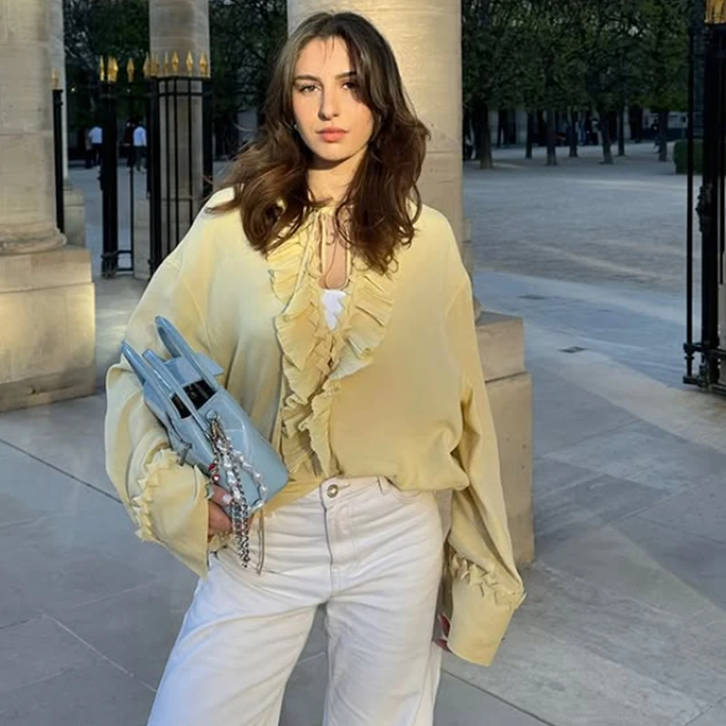 เสื้อผู้หญิง HXAO แบบระบายสีเหลือง เสื้อแขนยาวผูกเชือก ผ้าลูกไม้ เสื้อแฟชั่นฤดูใบไม้ร่วง ไซส์ใหญ่ ดีไซน์หรูหรา