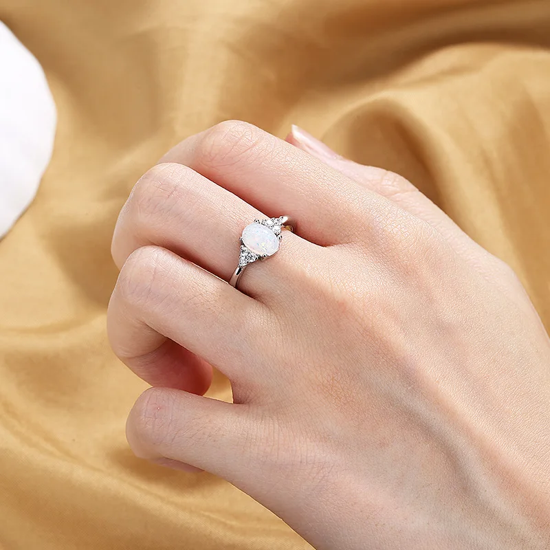 Jianyue egg shaped ring for women, retro and niche Australian treasure ring, European style inlaid oval zircon engagement ring