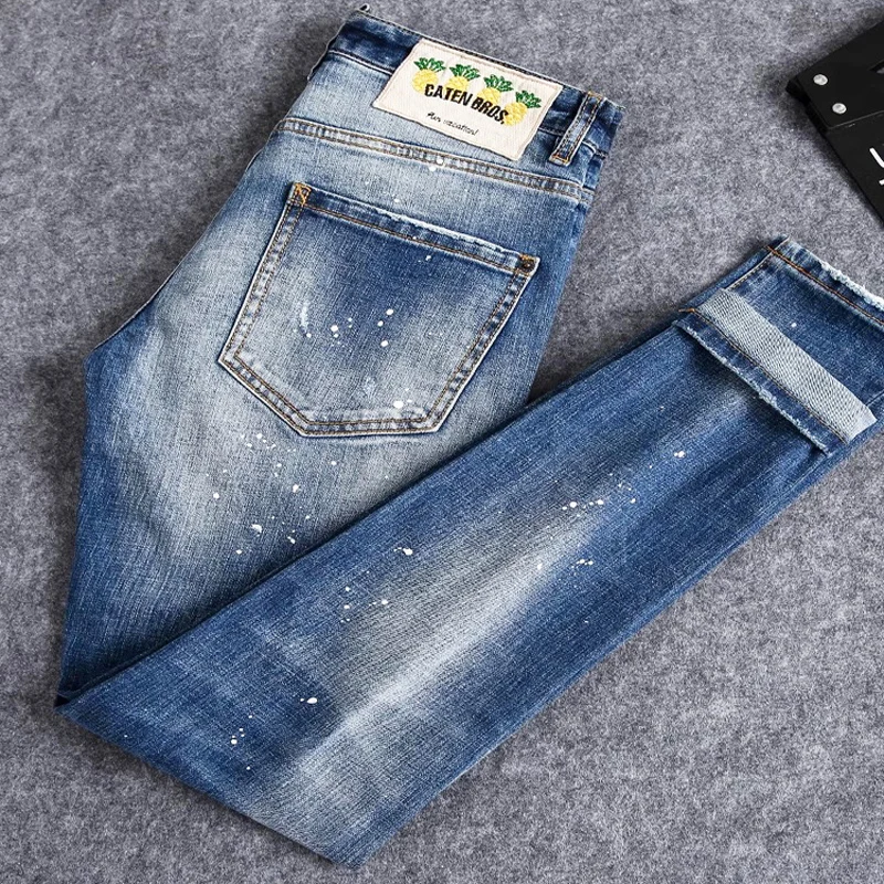 y2k fashion new jeans with painted pleats, slim fit, elastic wash, nostalgic perforated patch, light blue jeans, high stree