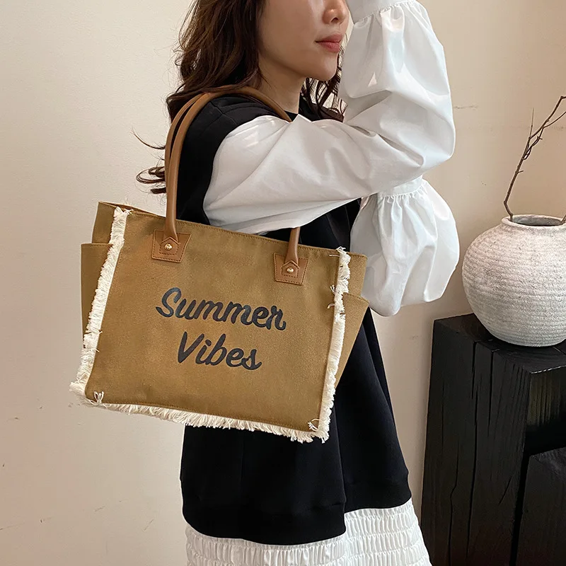 

2025 Новинка! Женская парусиновая большая сумка с буквенным принтом — простая сумка в стиле, пляжная сумка большой вместимости, нишевая мода