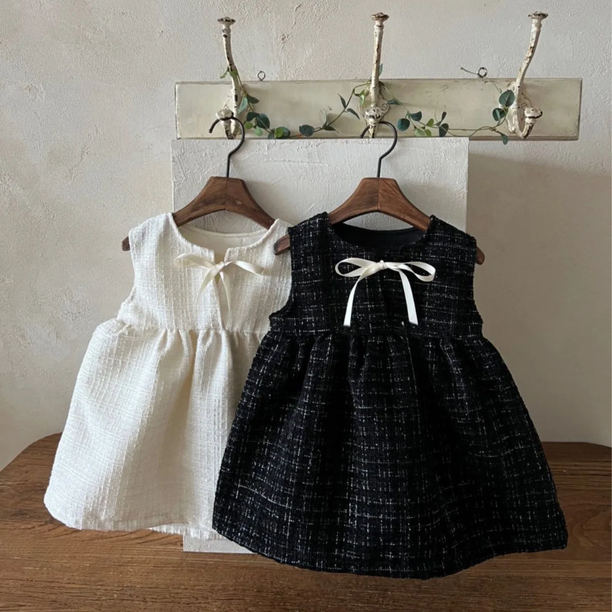 

2026 Spring New Baby Sleeveless Dress Cotton Girls Cute Bow Princess Dress Solid Infant Toddler Vest Dress Children Clothes