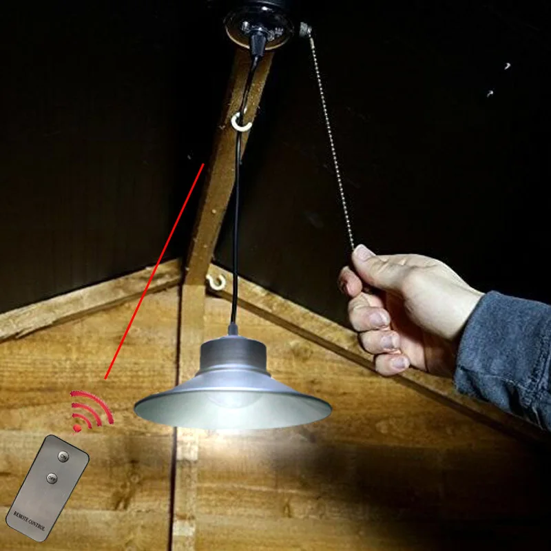 Solar-powered LED pendant light with remote control, pull-cord switch, and split design – ideal for sheds and tool rooms.