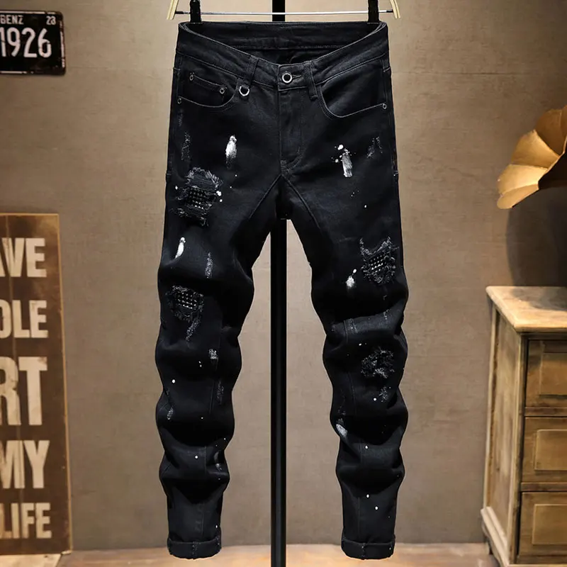 Jeans da uomo di moda di strada Jeans strappati dipinti Slim Fit elasticizzati neri da uomo che bordano pantaloni di Jeans elastici Hip Hop di design Patched