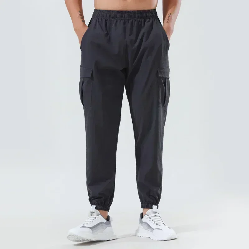 Solid Color Men's Sports Pants Spring Outdoor Quick-drying Pants Loose Woven Elastic Bunched Feet Fitness Casual Cargo Pants