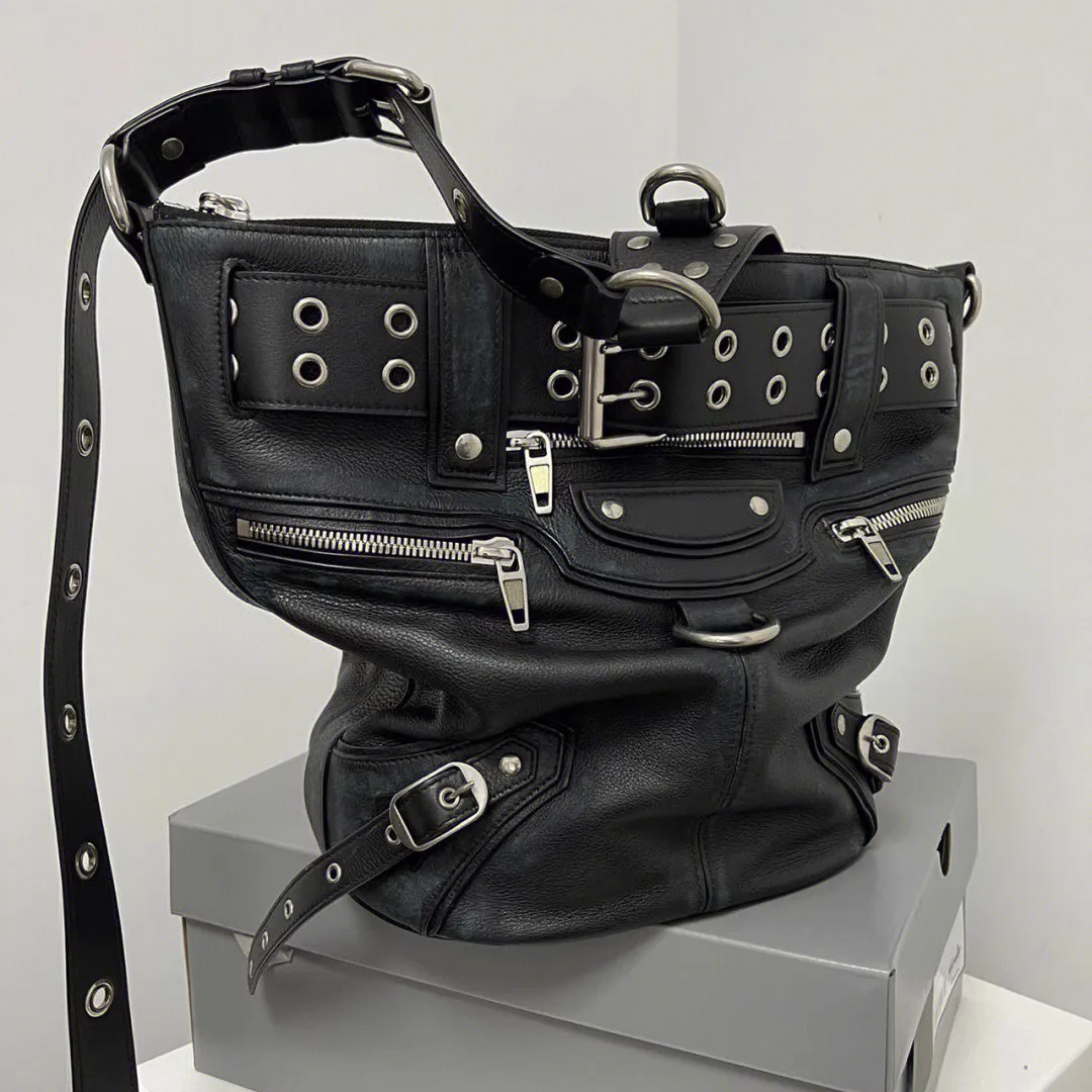 PU leather dark rivet heavy-duty motorcycle bucket backpack with multiple pockets, rugged workwear style, women's crossbody bag