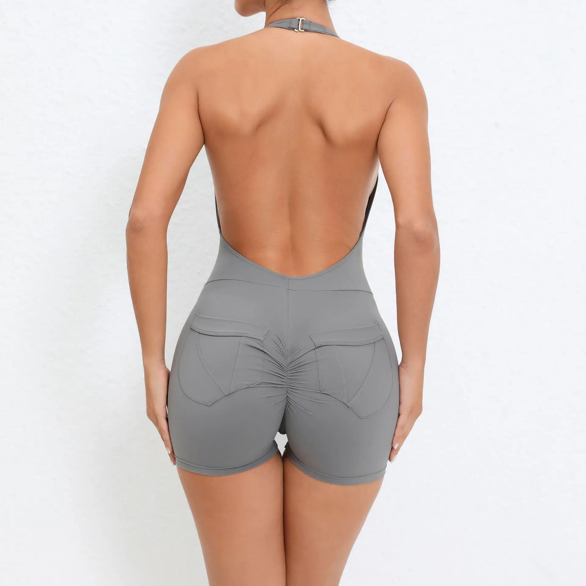 مثير عارية الذراعين Playsuits النساء الرياضة اللياقة البدنية شنقا الرقبة قطعة واحدة ملابس رياضية لليوجا المرأة اليوغا جيب بذلة الزي الصالة الرياضية مجموعة