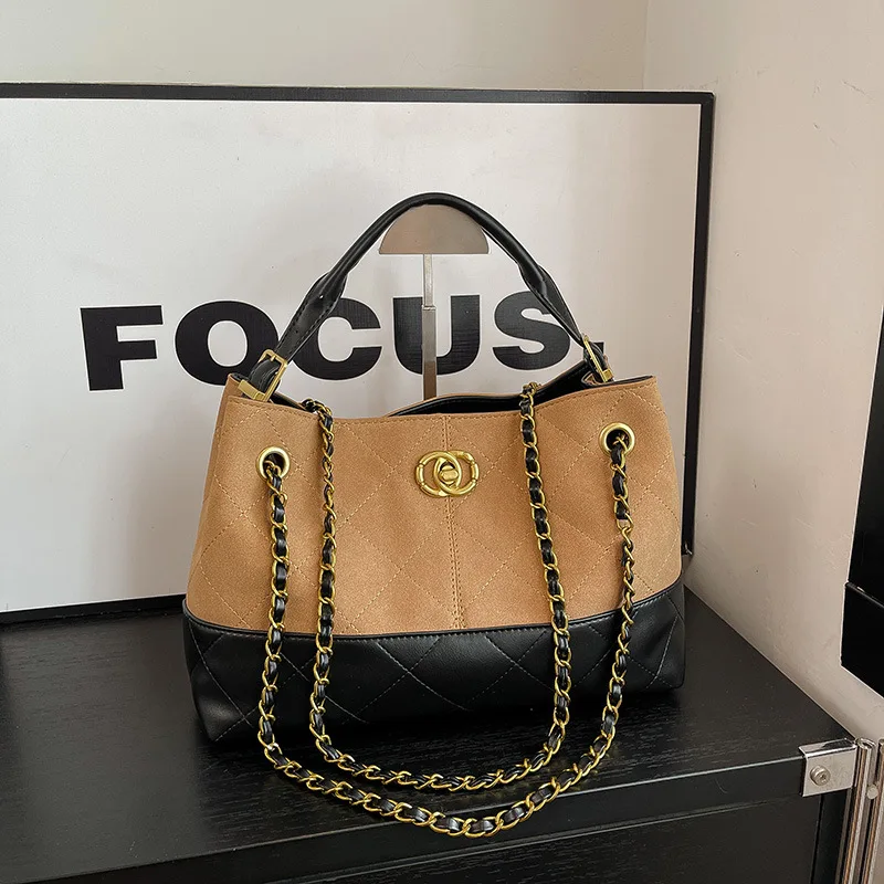 

New niche light luxury handbag color matching bucket bag trend chain bag retro single shoulder oblique span women's bag