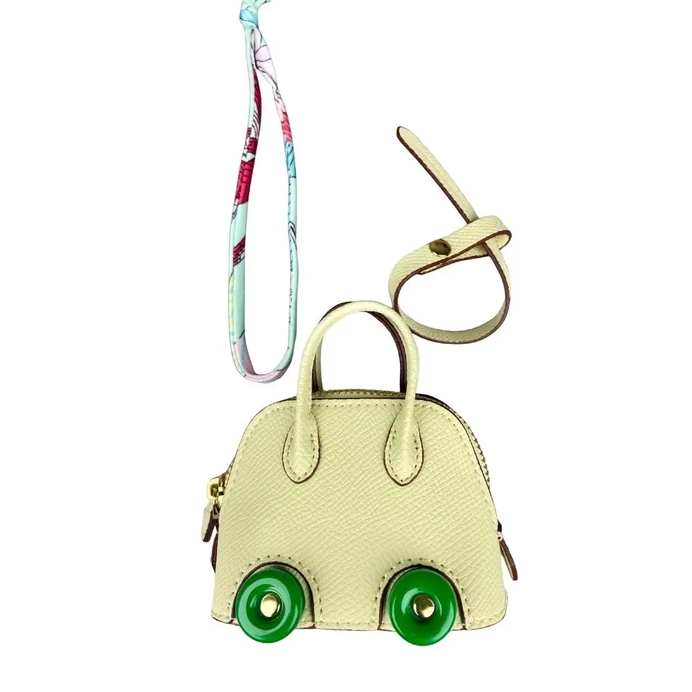 Mini-Taschenanhänger aus Leder mit niedlichen Rädern – Kopfhörer- und Lippenstiftbeutel mit zwei Riemen – PU-Leder – ideal für Taschenzubehör – Detail 12