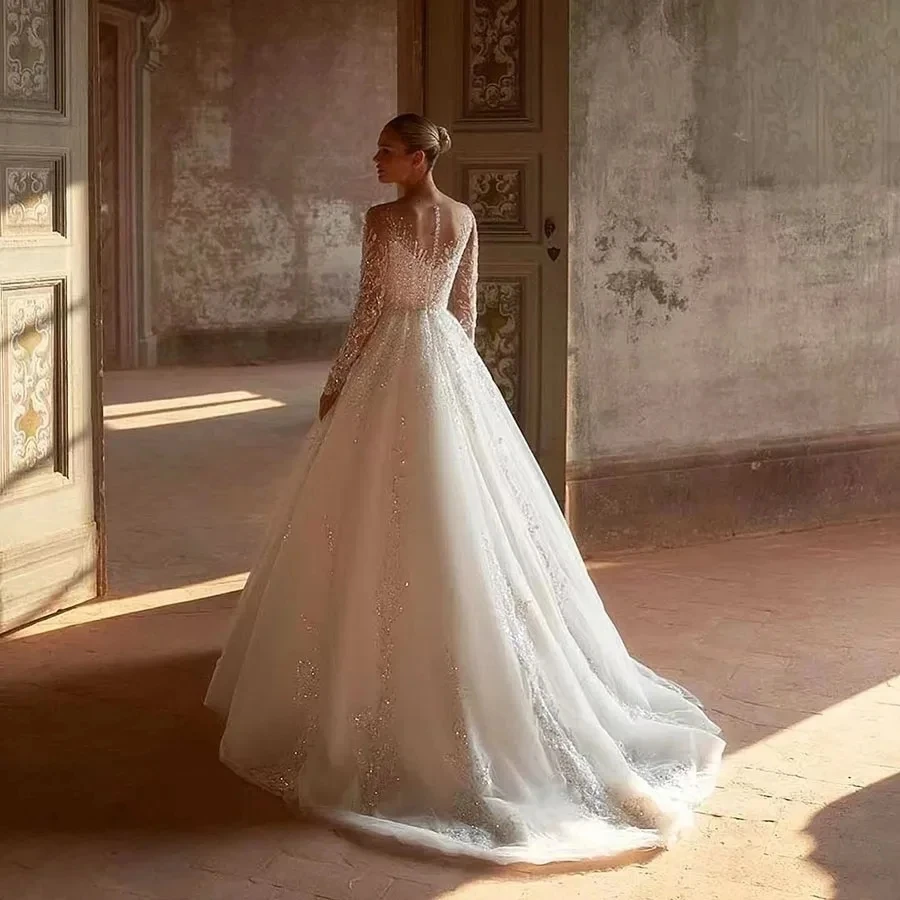 Classique église a-ligne robes de mariée 2026 col transparent paillettes dentelle manches longues Tulle robes de mariée robes de noiva