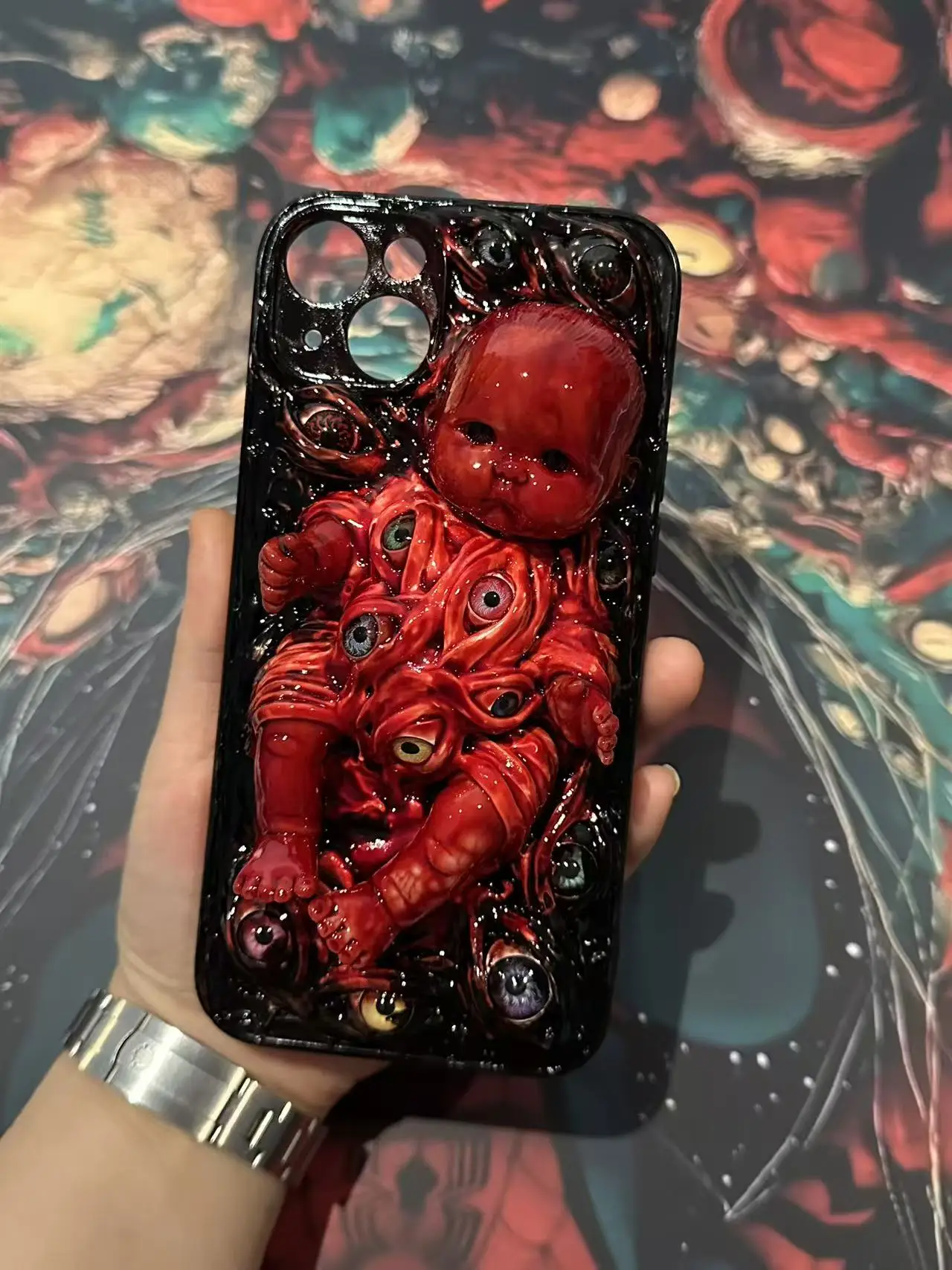

Halloween horror silicone ghost doll human eye phone case, suitable for 16 Pro Max 15 14 12 Mini 11 8 Plus XR iPhone phone case.