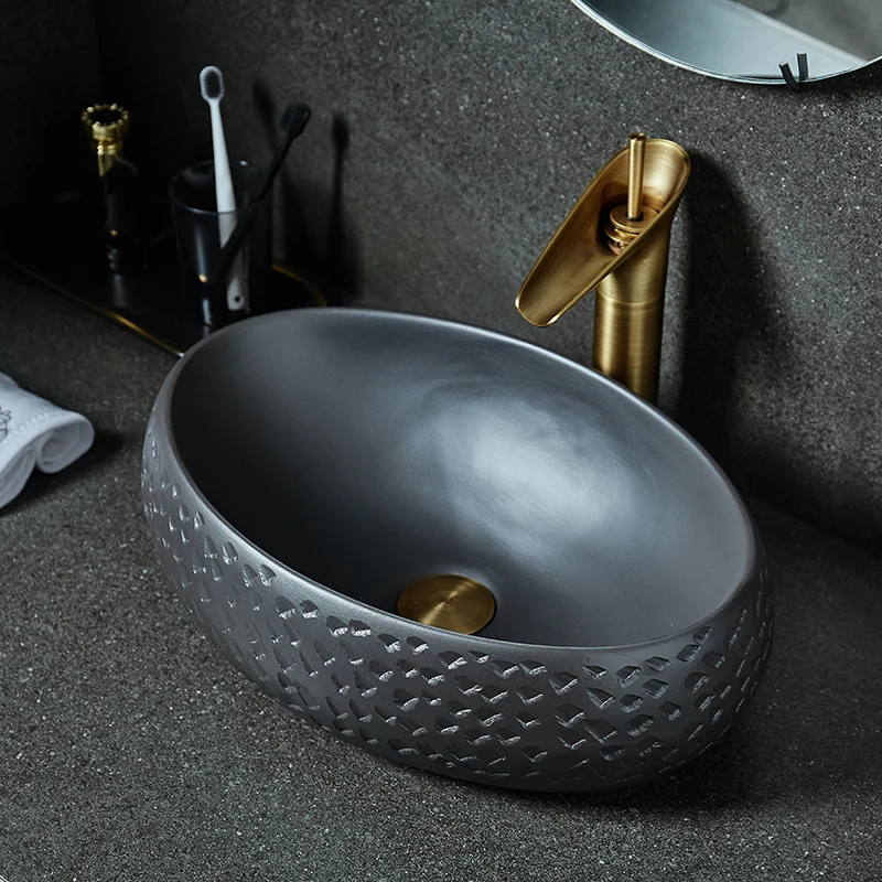 

Luxurious Embossed Golden porcelain bathroom vanity bathroom sink bowl countertop Oval Ceramic wash basin bathroom sink