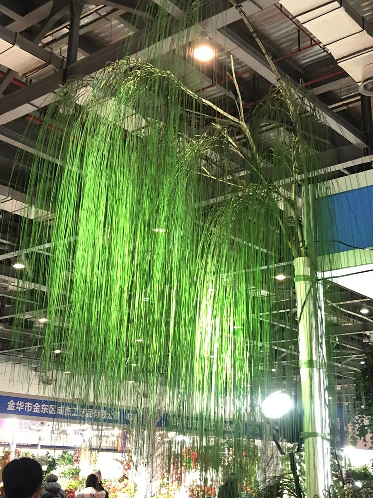 Simulate a curtain of dreams, steel wire hanging, flowing water, leaves, green plants, vines, and willow hanging shape