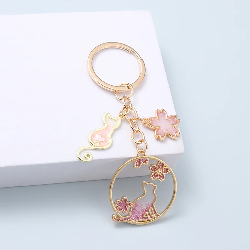 Llaveros de gato con bonitas flores, llaveros de plantas de animales de flor de cerezo para mujeres y niñas, joyería hecha a mano de amistad de cumpleaños