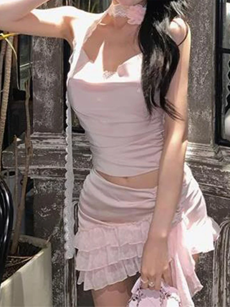 Zestaw dwuczęściowy: asymetryczny crop top z koronką w stylu Pure Desire Spicy Girl i spódnica z wysokim stanem, letni, modny design.