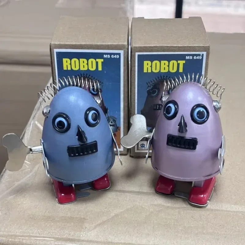 [Divertido] colección para adultos juguete de cuerda Retro Metal estaño espacio huevo alienígena robot en forma de huevo figura mecánica de juguete