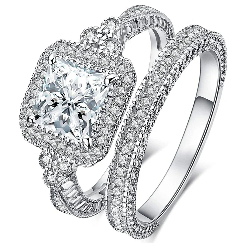 Huitan Opulent 2-teiliges Set mit kubischen Zirkonia-Ringen für Damen, trendiges, wunderschönes Verlobungszubehör, schicker Prinzessinnen-CZ-Hochzeitsschmuck