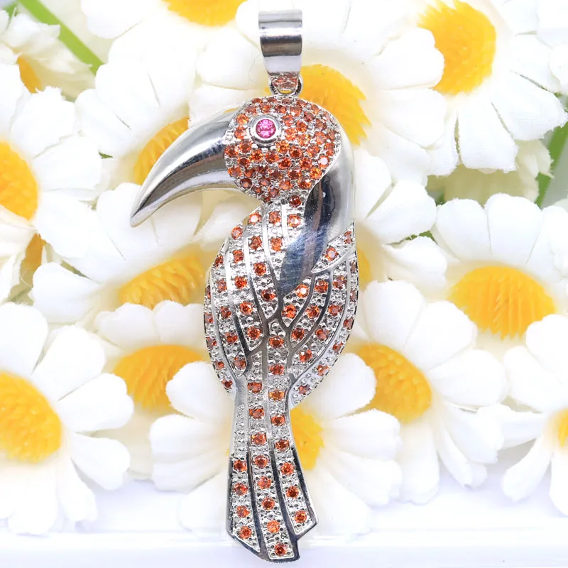 

Купи 5, получи 1 бесплатно: Серебряный кулон в форме тукана с оранжевым спессартином, белым сапфиром и турмалином, 56x22 мм, 6,1 г, подарок для женщин