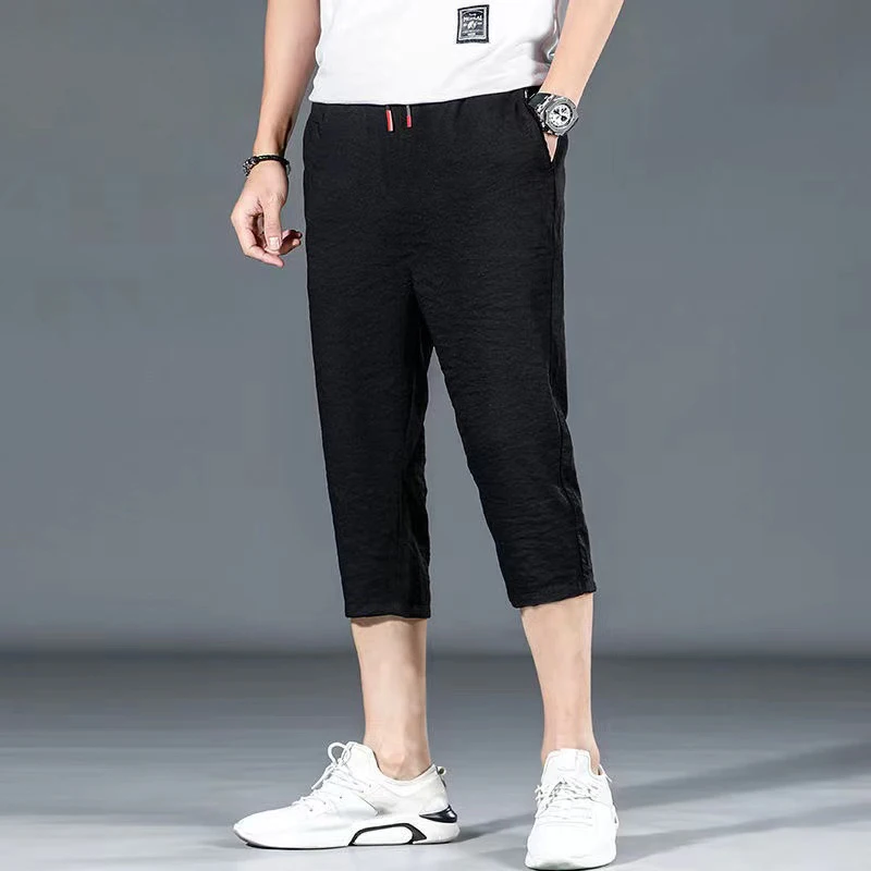 

Мужские летние повседневные спортивные брюки из тонкого ледяного шелка на семь футов, свободные модные летние брюки, молодежные брюки большого размера