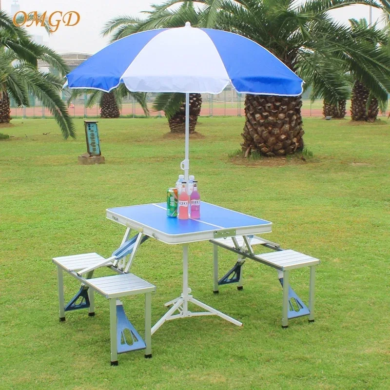 OMGD Outdoor Folding Table Aluminium Alloy One-piece Portable Stall Promotional Camping Barbecue Table And Chairs Set News