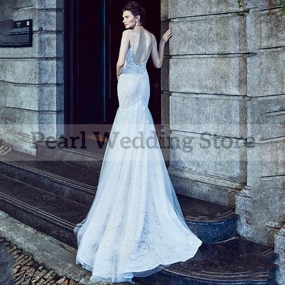 White Wedding Dresses Spaghetti Strap and Sexy Backless Mermaid Lace Appliques High Quality Customizable Bridal Marry Gowns