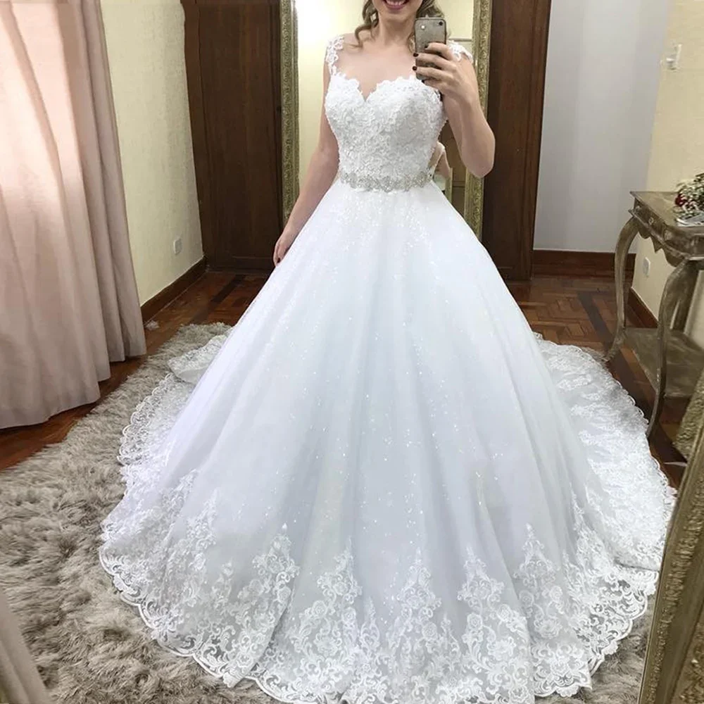 فساتين زفاف عصرية ساحرة من الدانتيل تول بدون أكمام مع حزام كريستال فساتين زفاف 2025 vestido de casamento hochzeitskleid