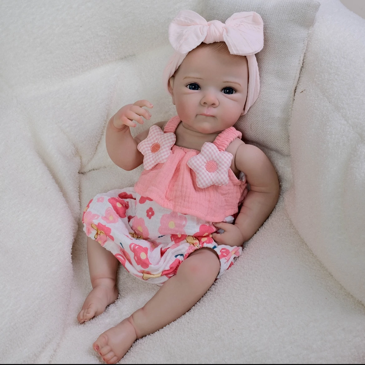 

18"Reborn Baby Doll Bettie in Pink Star Print Strappy Romper Lifelike Newborn with Hand-Painted Veins & Ultra-Soft Body