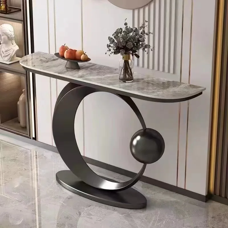 Console designers create unique family entry tables and furniture for the lobby