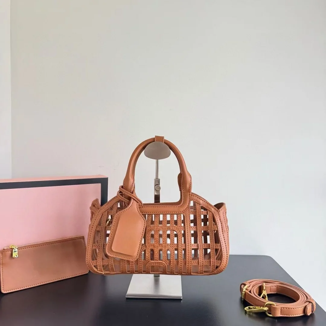 

New leather woven hollow lady handbag 2025 fashion Joker lazy wind niche design large-capacity basket woven portable Women's bag