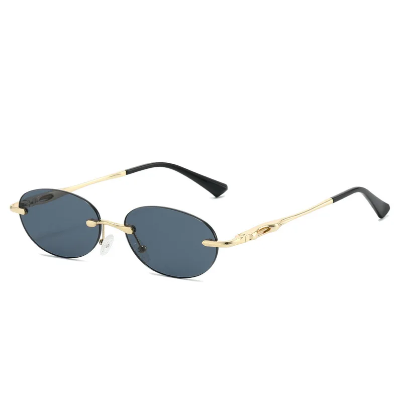 Korean version of fashion frameless oval shape sunglasses men and women driving travel sunglasses