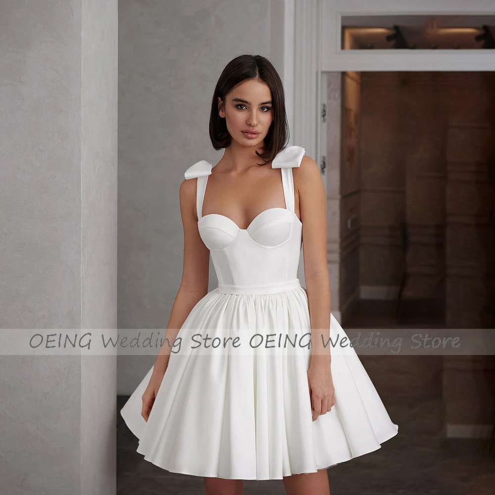 Mini abiti da sposa per le donne 2023 sposa Sweetheart una linea abiti da sposa fiocco bianco cintura senza schienale abito da sposa corto in raso