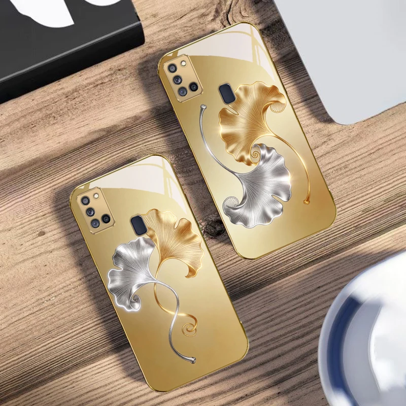 

Ginkgo leaves dancing For Samsung A 31 32 A33 A34 35 14 A15 13 16 25 26 50 52 53 54 55 56 70 71 72 73 Golden glass phone case