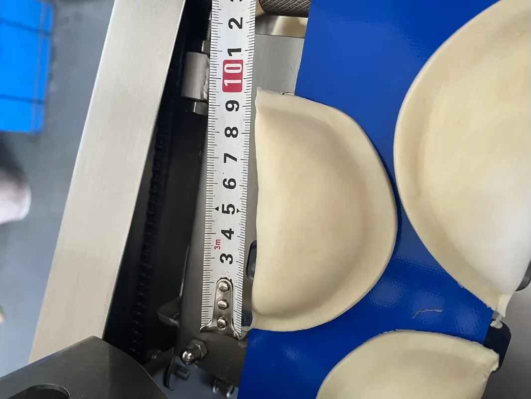 Picture 4: factory direct supply automatic samosa roti maker chapati making pastry machine pakistan india samosa making machine low price