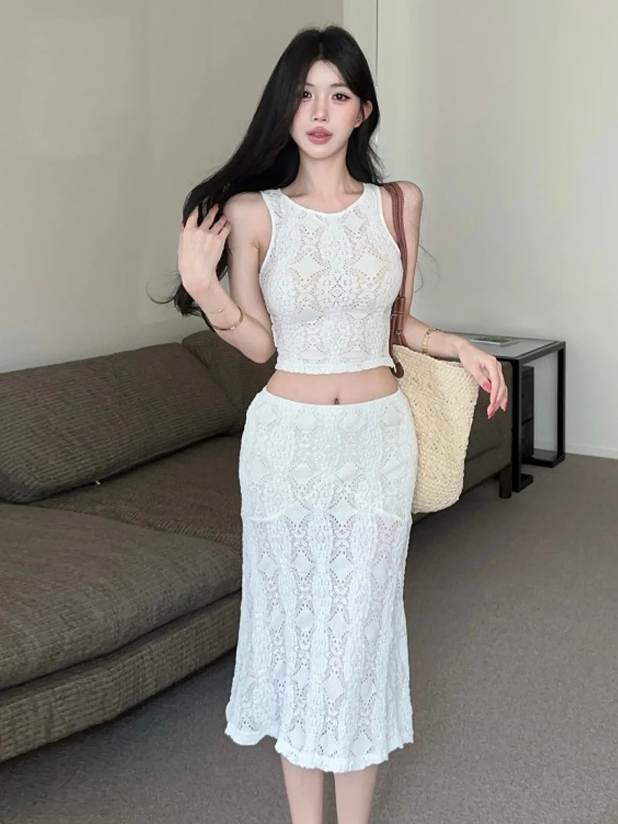 

Elegant Pure Desire Vacation Style Hollow out Knitted Lace Sleeveless Short Vest with Fish Tail Wrap around Skirt Two Piece Set
