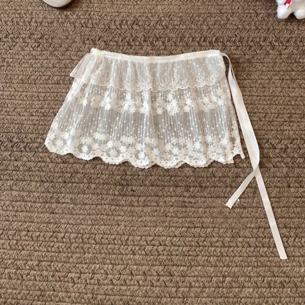 Y2K الحلو الدانتيل تنورة صغيرة زهرة عالية الخصر الشاش تنورة الدانتيل متابعة الكورية نمط تكدرت حافة تنورة الفتيات