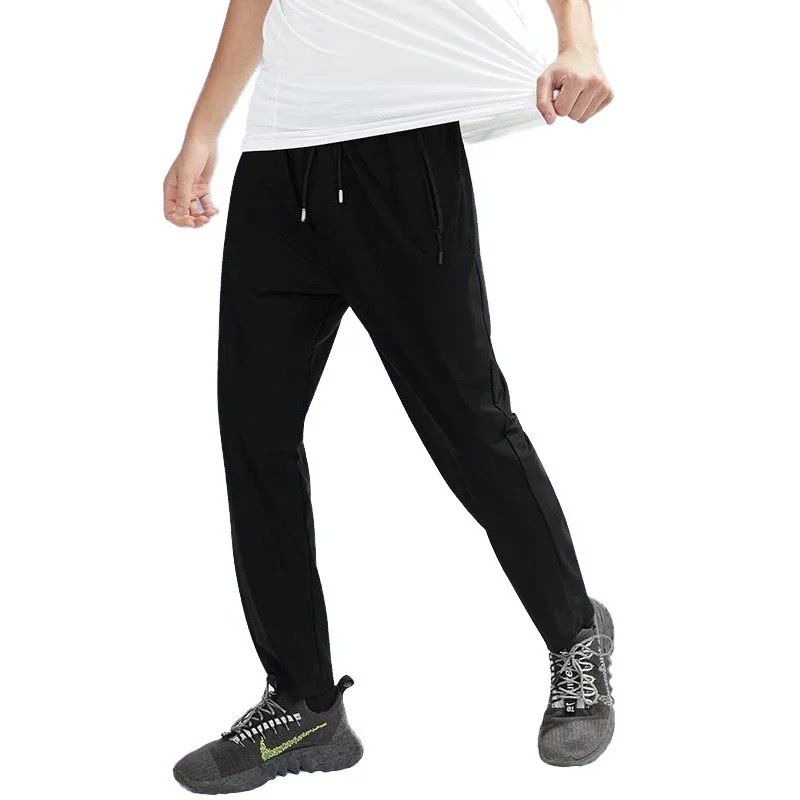 Calças de seda gelo de secagem rápida quatro vias estiramento respirável masculino runn sweatpants ginásio fitness esporte treinamento tubo reto sweatpants