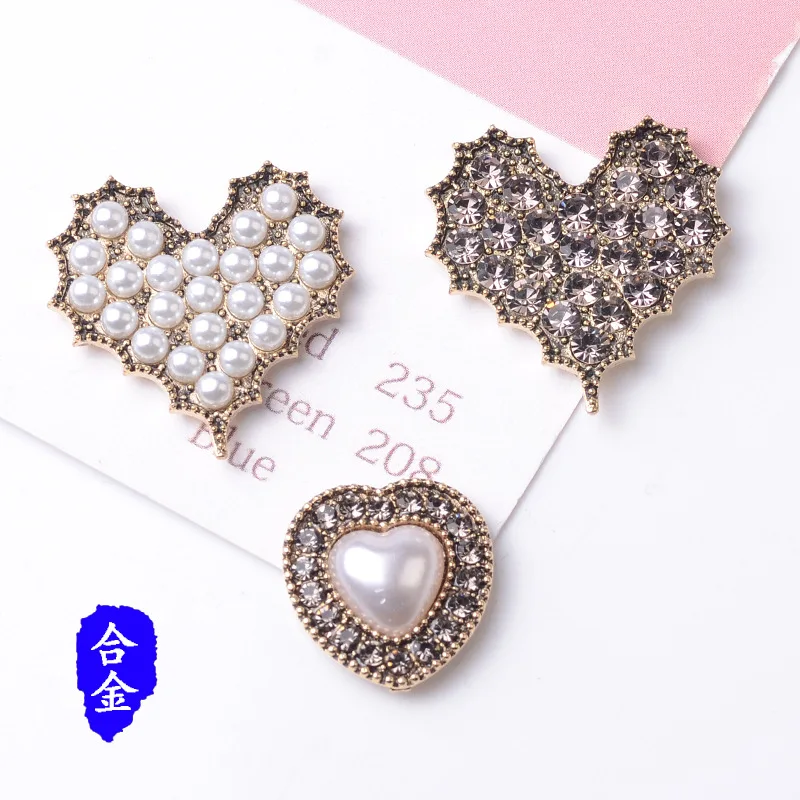 

100 pieces set new retro pearl water crystal peach heart crystal buckle DIY handmade shoes and clothing bags spot wholesale