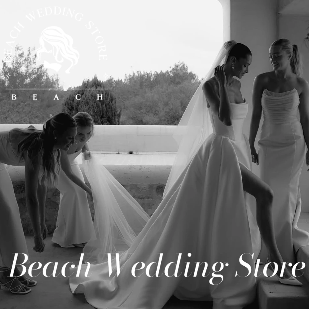 

Beach Costumized Simple Eleglant Backeless Selveeless Wedding Dresses for Women 2025 Strapless Satin Floor Length Bridal Gowns