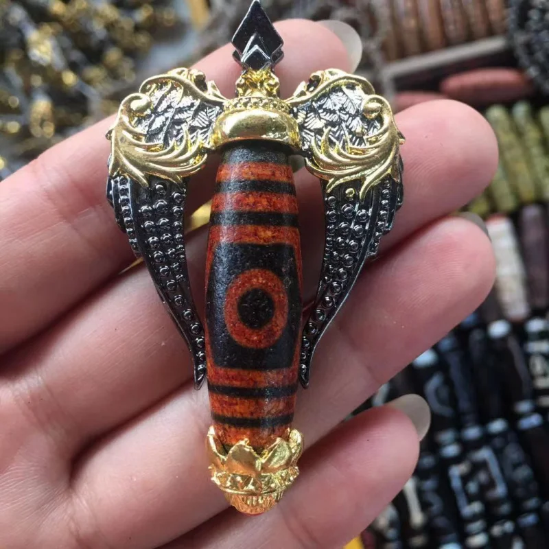 

Tibetan-style inlaid dzi bead pendant with weathered patterns high oil patina, suitable both men and women