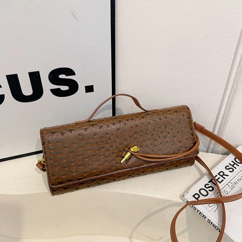 

2025 Spring & Summer Women's Ostrich Pattern Cowhide Dinner Bag Latch Long - Handle Shoulder Messenger Bag