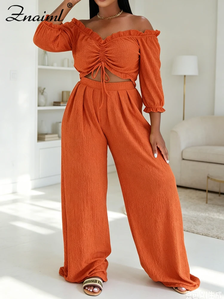

Znaiml Women's 2 Piece Outfit Off Shoulder Ruffle Top and Wide Leg Pants Set Casual Summer Loungewear for Beach Paarty Vacation