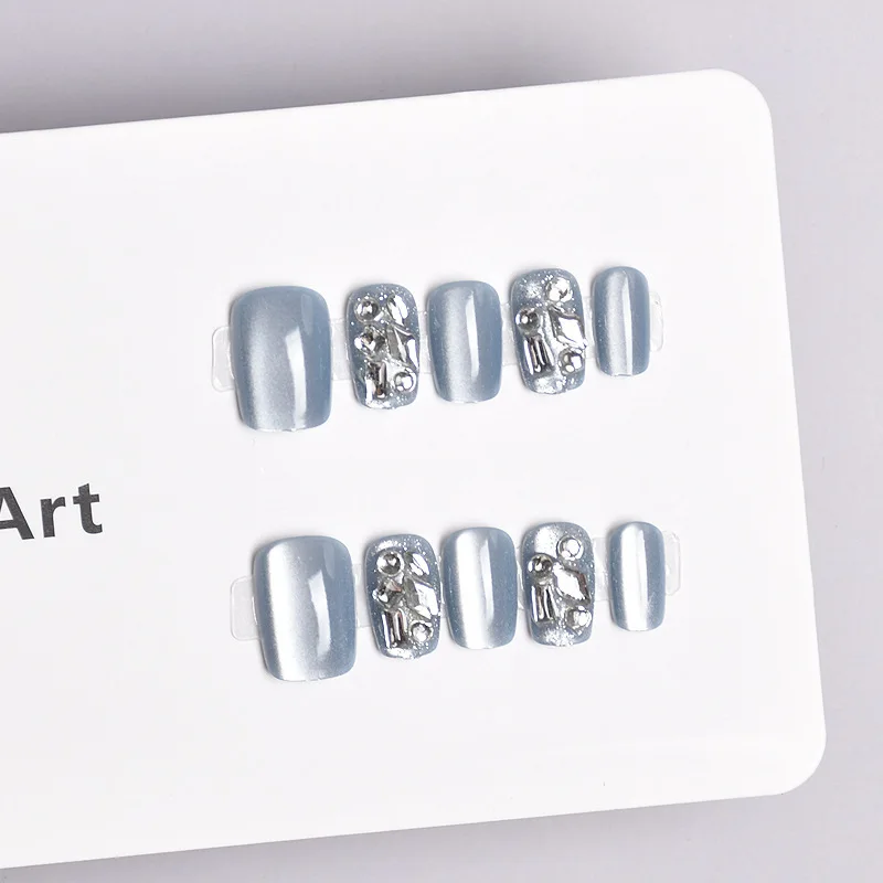 손톱에 네일 라인스톤프레스를 착용하는 아이스 블루 10개 팩