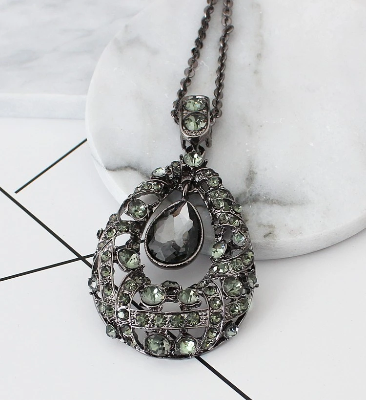 2026 Fashion Women Hollow Printing Triangle Pendant Necklace Long Metal Sweater Chain Alloy Accessories Jewelry For Women Gift